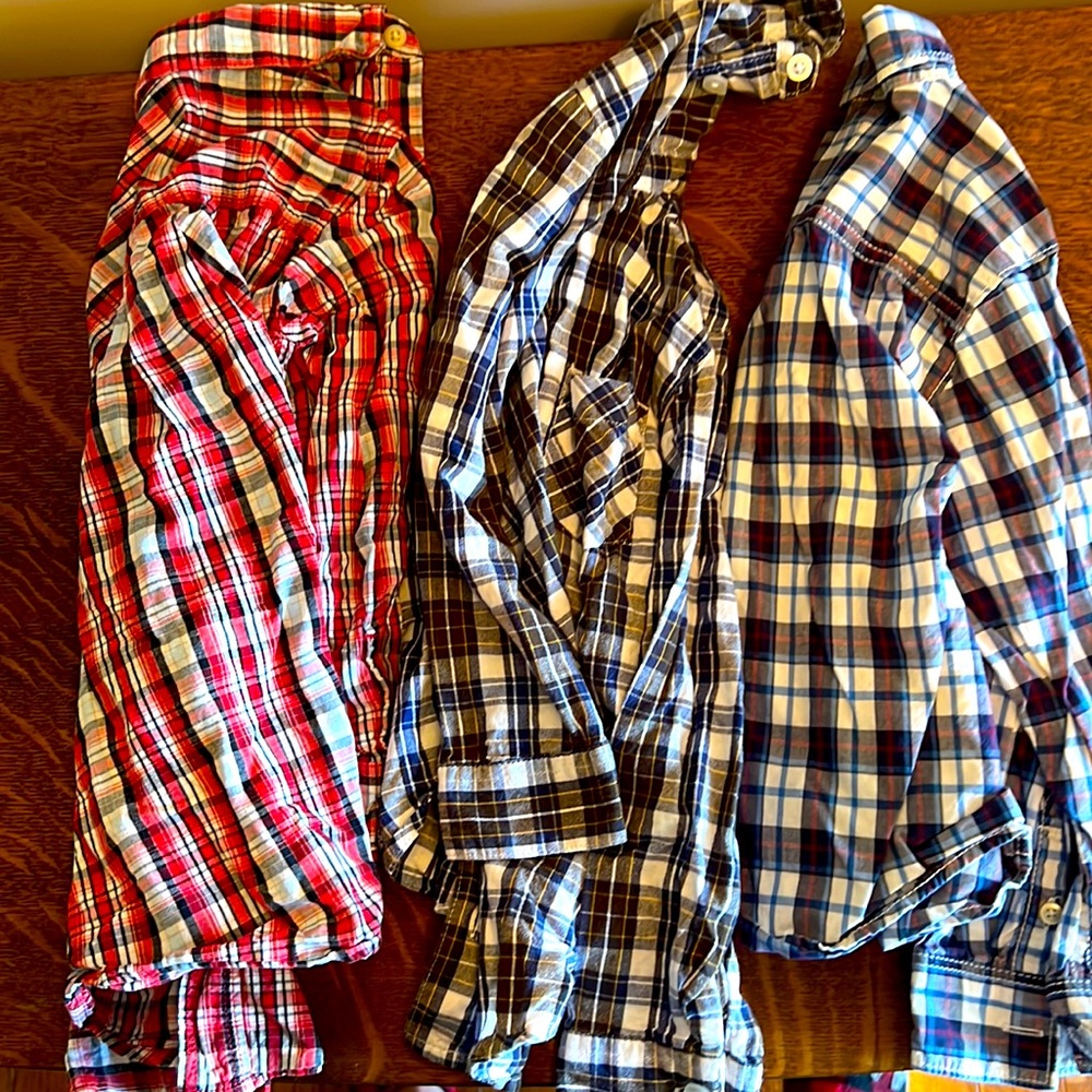 Three plaid shirts